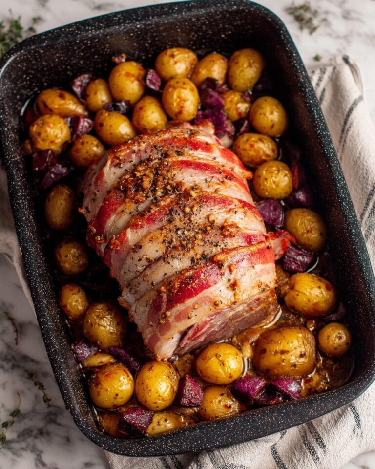 Bacon-Wrapped Turkey Breast with Chorizo, Cranberries, and Little Potatoes Recipe