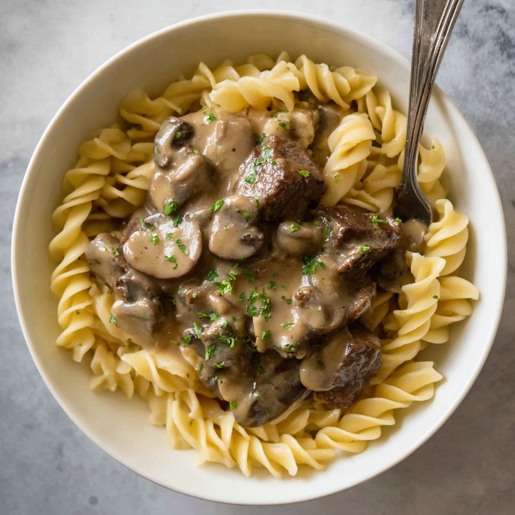 Creamy Beef Stroganoff with Mushrooms and Egg Noodles Recipe - Recipe Image